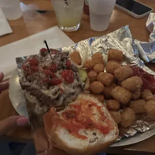 Double meat burger with tots
