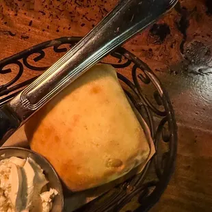 Dinner roll and butter.
