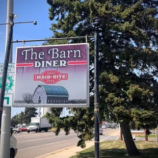a sign for the barn diner