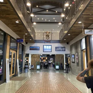 The entrance of the Cattle building showing the bar in the back.