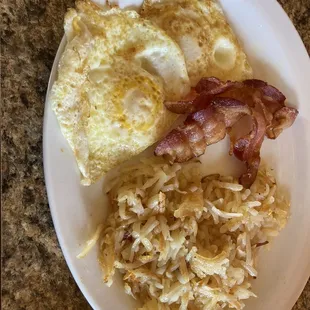 Hash browns, 2 eggs, and twi strips of bacon, cost a little under $9.    Beware that 2 Strips of bacon costs $4.