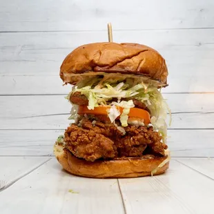Original Chicken: Brioche Bun, Choice of Chicken, Swiss,  Ranch Dressing, Pickles, Lettuce, Tomatoes