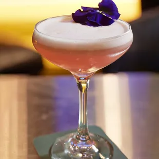 a cocktail in a coupe glass