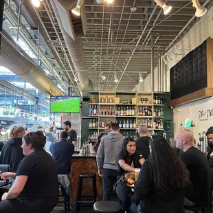 people sitting at the bar