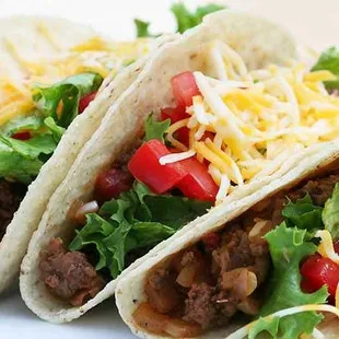 three tacos on a plate
