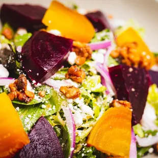 Mixed Beet Salad - red and golden beets, mixed greens, red onion, goat cheese, candied walnuts, balsamic vinaigrette.