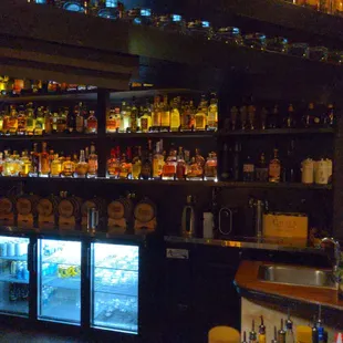 a bar with bottles of alcohol