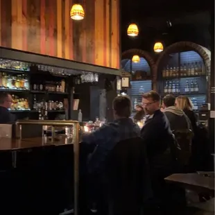 people sitting at a bar