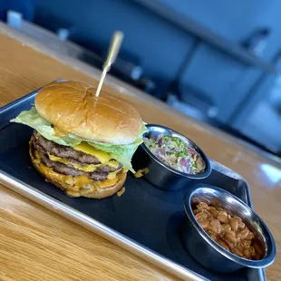 a cheeseburger and sides