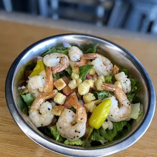 a bowl of shrimp salad
