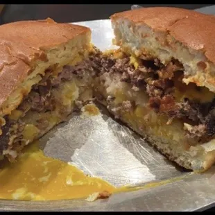 The Drunk Tank burger (fried egg, hash brown, hamburger, American cheese, bacon and spicy ketchup)