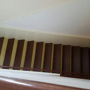 Wood floors throughout the Inn including the banister staircase.