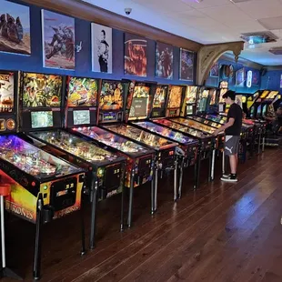 a row of pinball machines