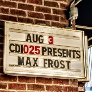 a sign on the side of a building