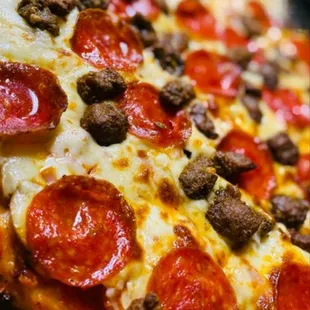 a pepperoni and sausage pizza