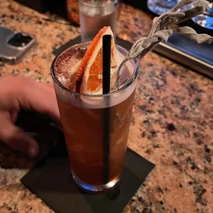 a person holding a drink