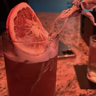 a glass of blood orange juice