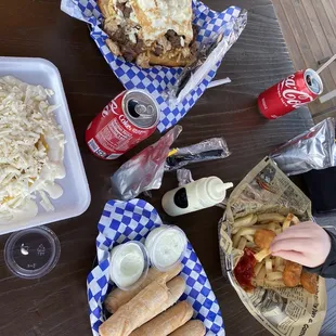 a table full of food and drinks