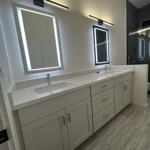 Mirrors and faucets from Bathroom store.