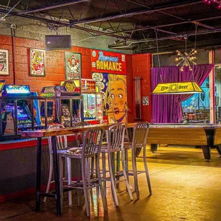 a game room with arcade machines