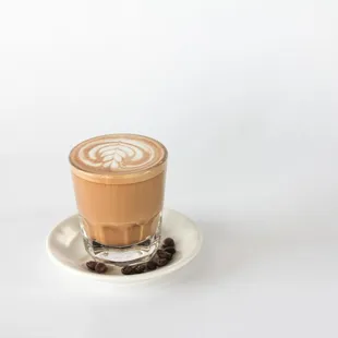 a cup of coffee on a saucer