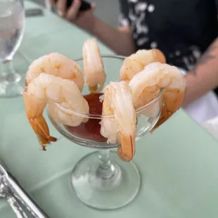 a glass of shrimp cocktail