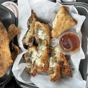 Philly egg rolls with a side of catfish