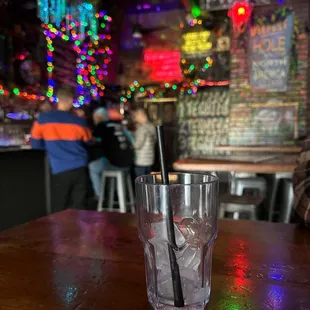 a drink in a glass on a table