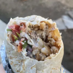 a burrito wrapped in foil