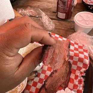 Dry old brisket, you can taste the container it was stored in