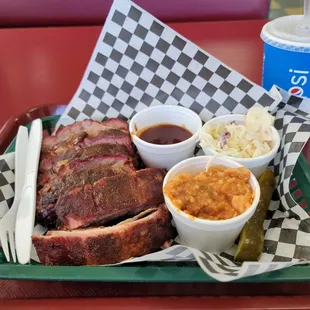 Half rack of ribs, jambalaya, and coleslaw from The BBQ Joint in Oak Harbor.