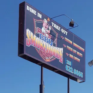 a sign for the bbq smokehouse