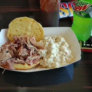 a pulled pork sandwich with coleslaw
