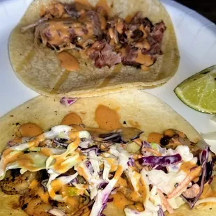 Tacos!  Carnitas on corn tortillas on top, grilled skrimps on four tortillas below.