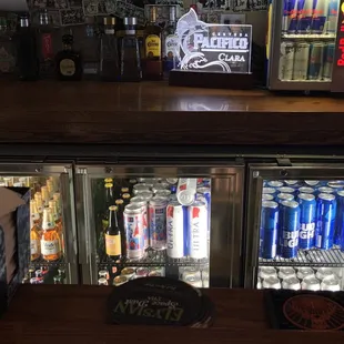 a bar with a beer fridge