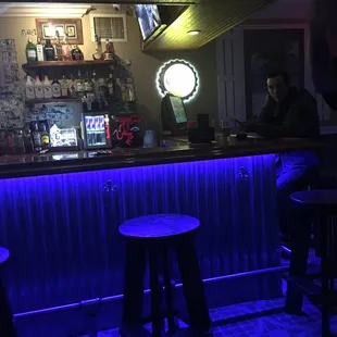 a bar with blue lights