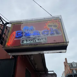 a neon sign for a bar