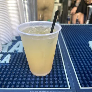 a drink in a plastic cup