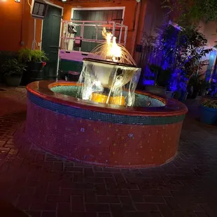 a fountain in a courtyard