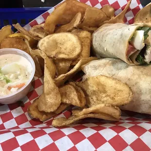 Calypso chicken wrap with homemade chips and coke slaw