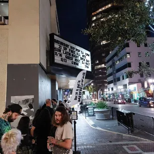 Waiting to get in. Line on both sides of the main entrance