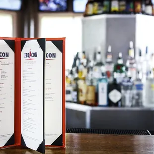 a menu on a bar counter