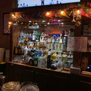 a bar with a television in the background