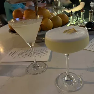 two cocktails on a table