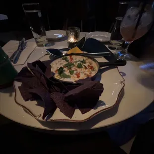 Mexican street corn dip with blue chips