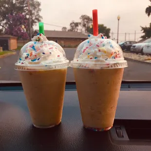 two cups of iced coffee with sprinkles