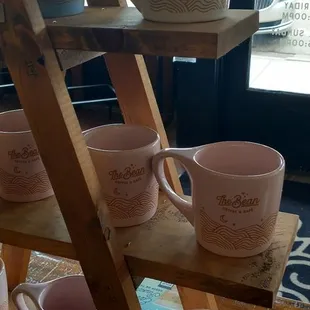Coffee mugs on display up front