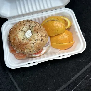 The everything bagel with salmon lox cream cheese hold the capers with orange slices sooooo delicious will get this one again