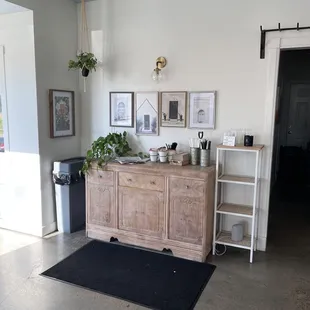 a kitchen with a black mat