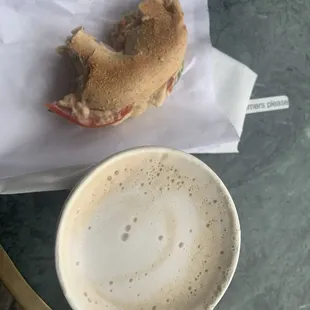 Cafe au laut and hummus veggie bagel.